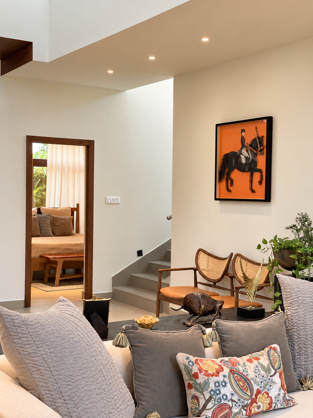 Upper landing with staircase and equestrian artwork, showcase villa, Bantala